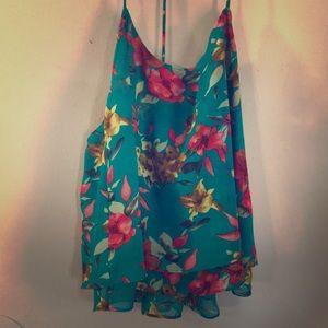 Floral T-back tank top. Adjustable straps.